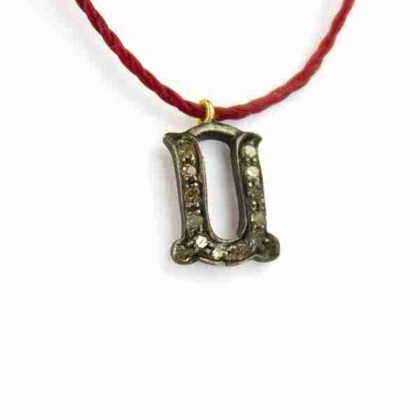 Colgante letra "U" con diamantes