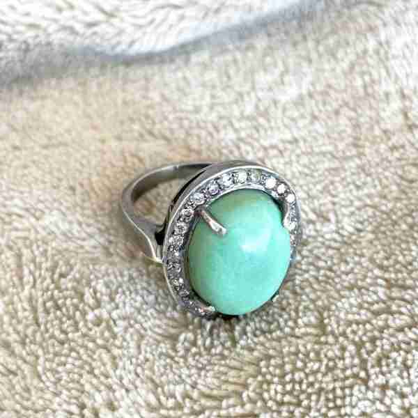 Anillo de plata con turquesa y diamantes